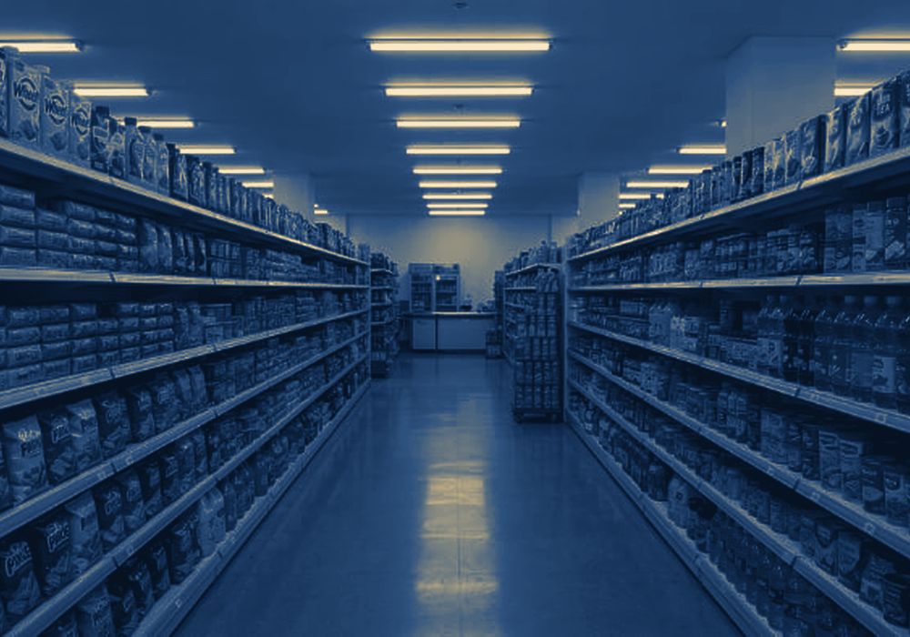 A retail aisle stocked with consumer goods
