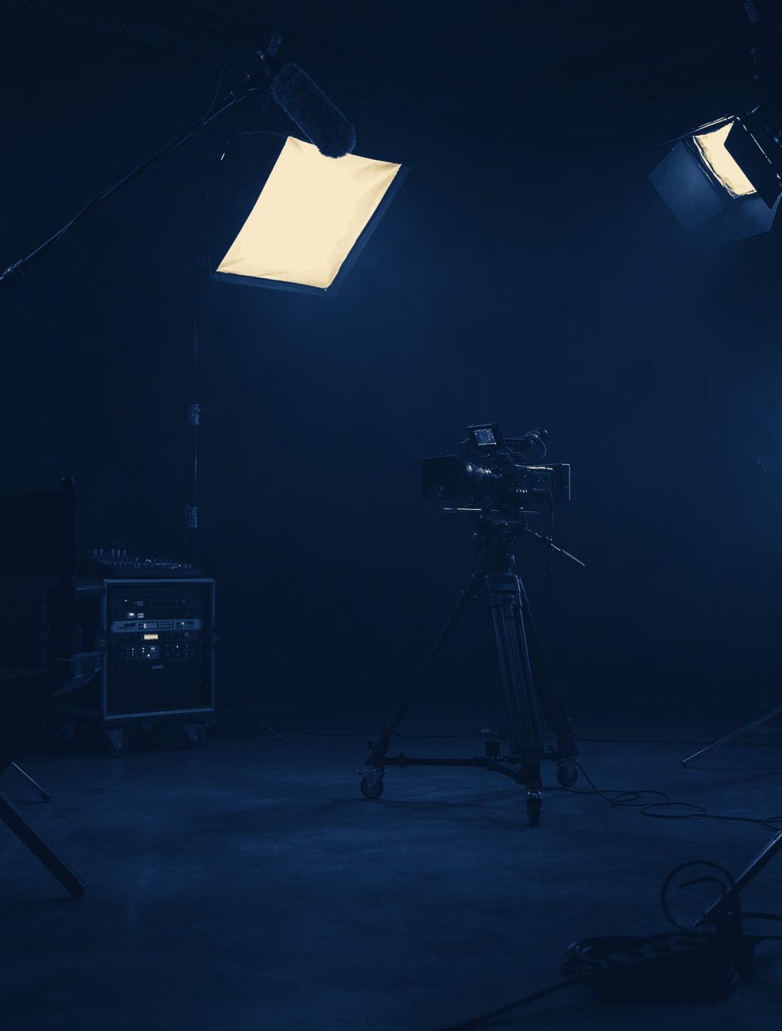 A broadcast studio floor lit for a shoot